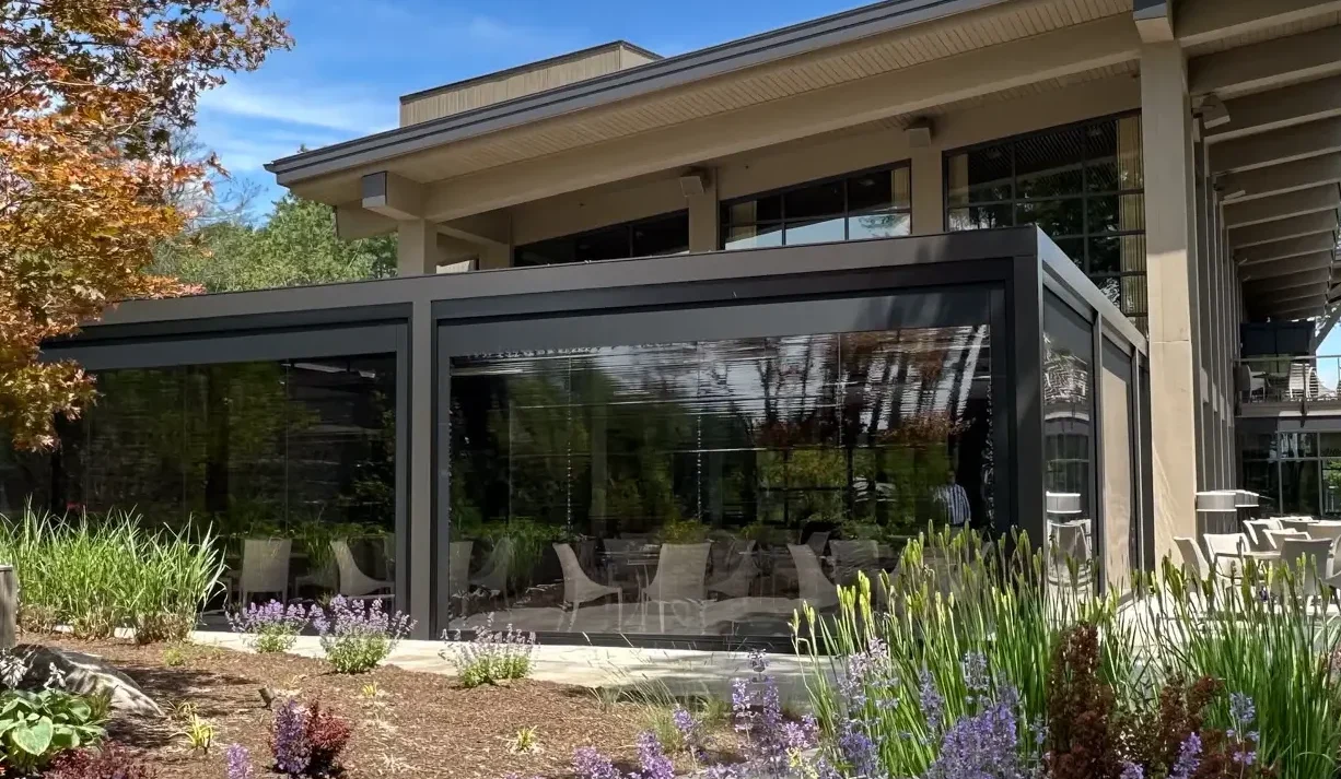 MagnaTrack™ Retractable Screens enclosing a restaurant and commercial patio in Georgia
