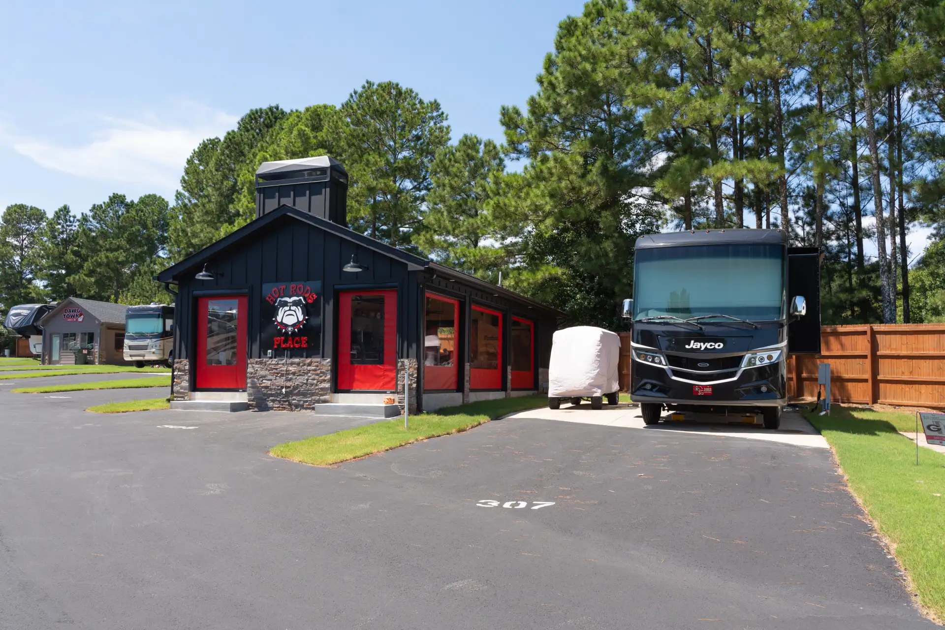 Custom motorized retractable screens installed at Bulldog Park in Athens Georgia